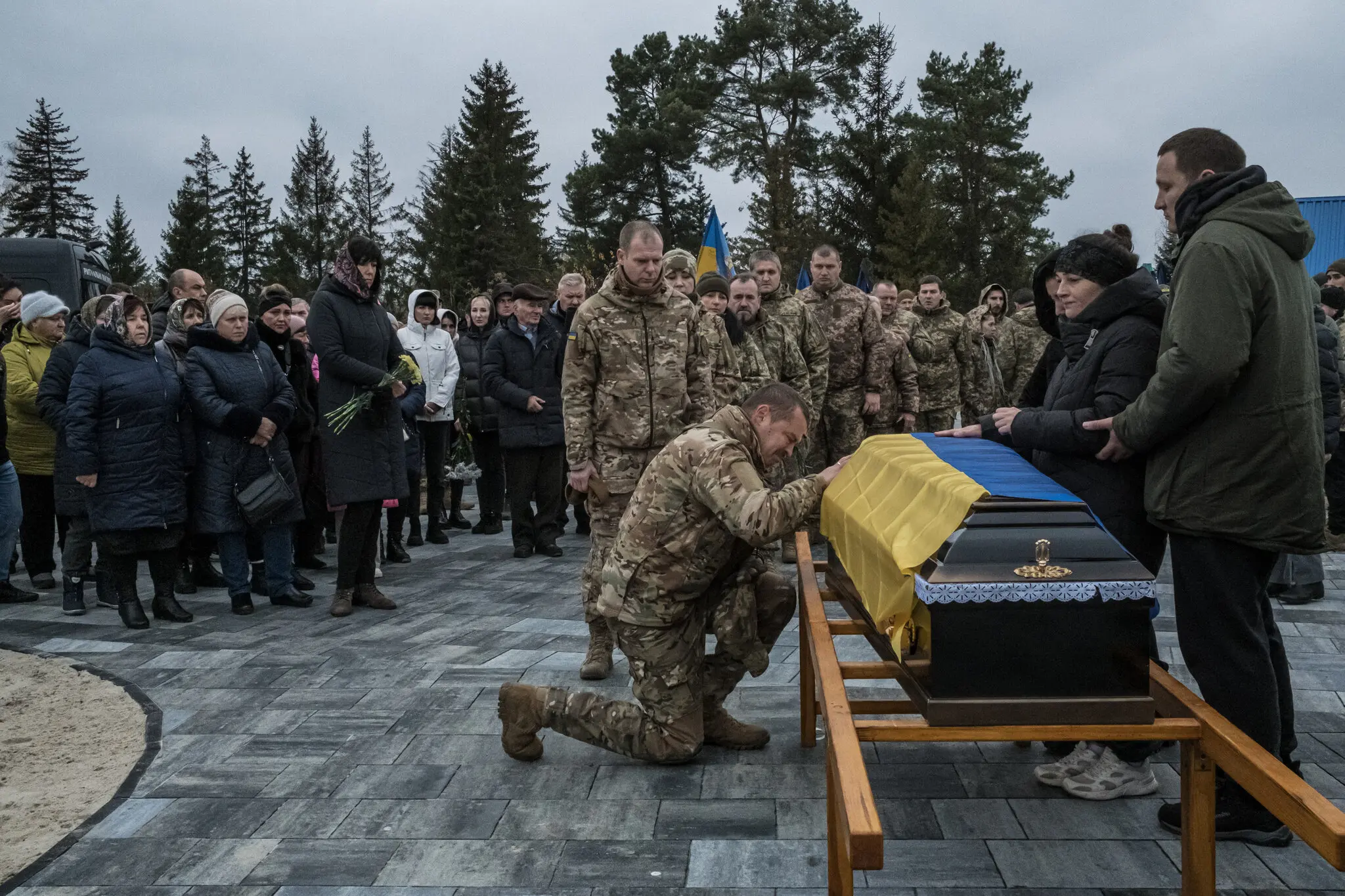 Український військовий похорон на околиці Києва в листопаді. Війна в Україні, ймовірно, буде домінуючою темою під час зустрічі Всесвітнього економічного форуму в Давосі, Швейцарія.